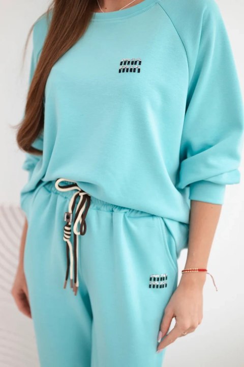 Komplet damski masełkowy z wiskozy z bluzą i spodniami turkusowy