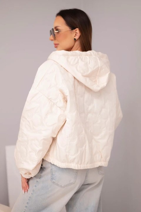 Kurtka damska pikowana z kapturem i ozdobnym tłoczeniem kwiatowym beżowa
