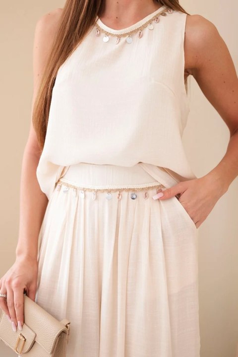 Komplet damski z wiskozą z topem bez rękawów i spodniami szeroka nogawka z ozdobnym wykończeniem beżowy