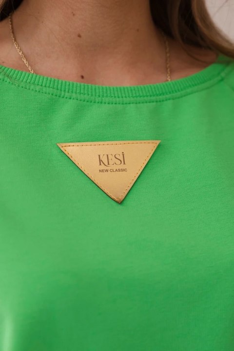 Bluzka bawełniana z falbankami na ramionach jasno zielona