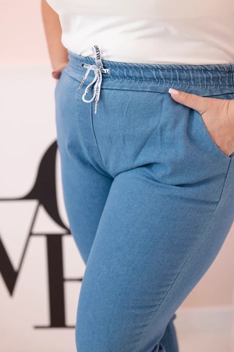 Spodnie damskie bawełniane Plus Size z elastyczną talią i wiązaniem jasno jeansowe