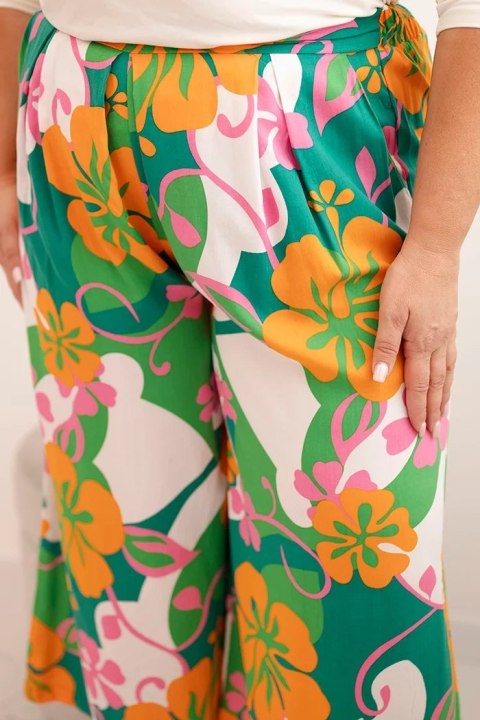 Spodnie damskie Plus Size wiskozowe z kwiatowym wzorem pomarańczowe