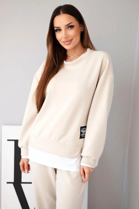 Komplet damski z masełkowy z luźną bluzą i spodniami dresowymi beżowy