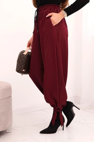 Spodnie damskie z szeroką nogawką i wiązaniem u dołu bordowe