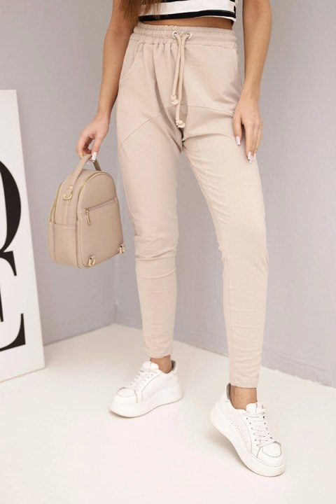 Spodnie damskie dresowe z elastycznym pasem i troczkiem beżowe