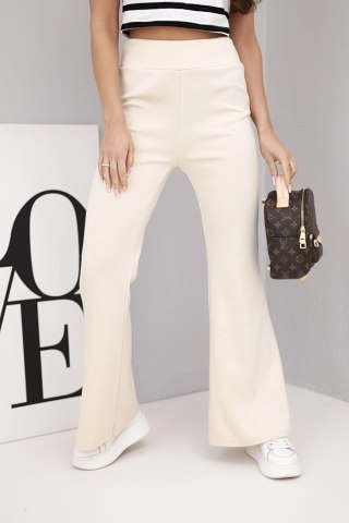 Spodnie damskie masełko z rozszerzaną nogawką beżowe