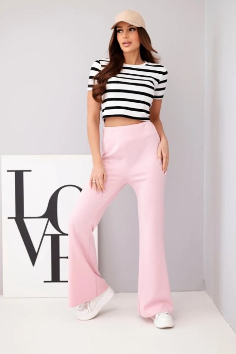 Spodnie damskie masełko z rozszerzaną nogawką jasno różowe