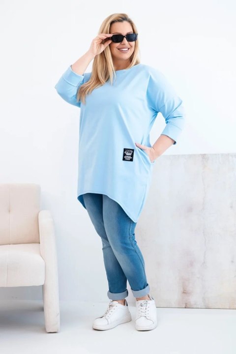 Bluzka damska Plus Size z dłuższym tyłem i długim rękawem niebieska