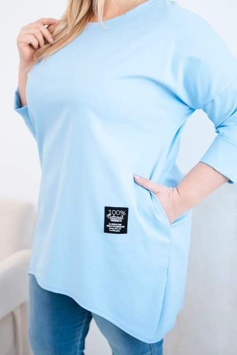 Bluzka damska Plus Size z dłuższym tyłem i długim rękawem niebieska